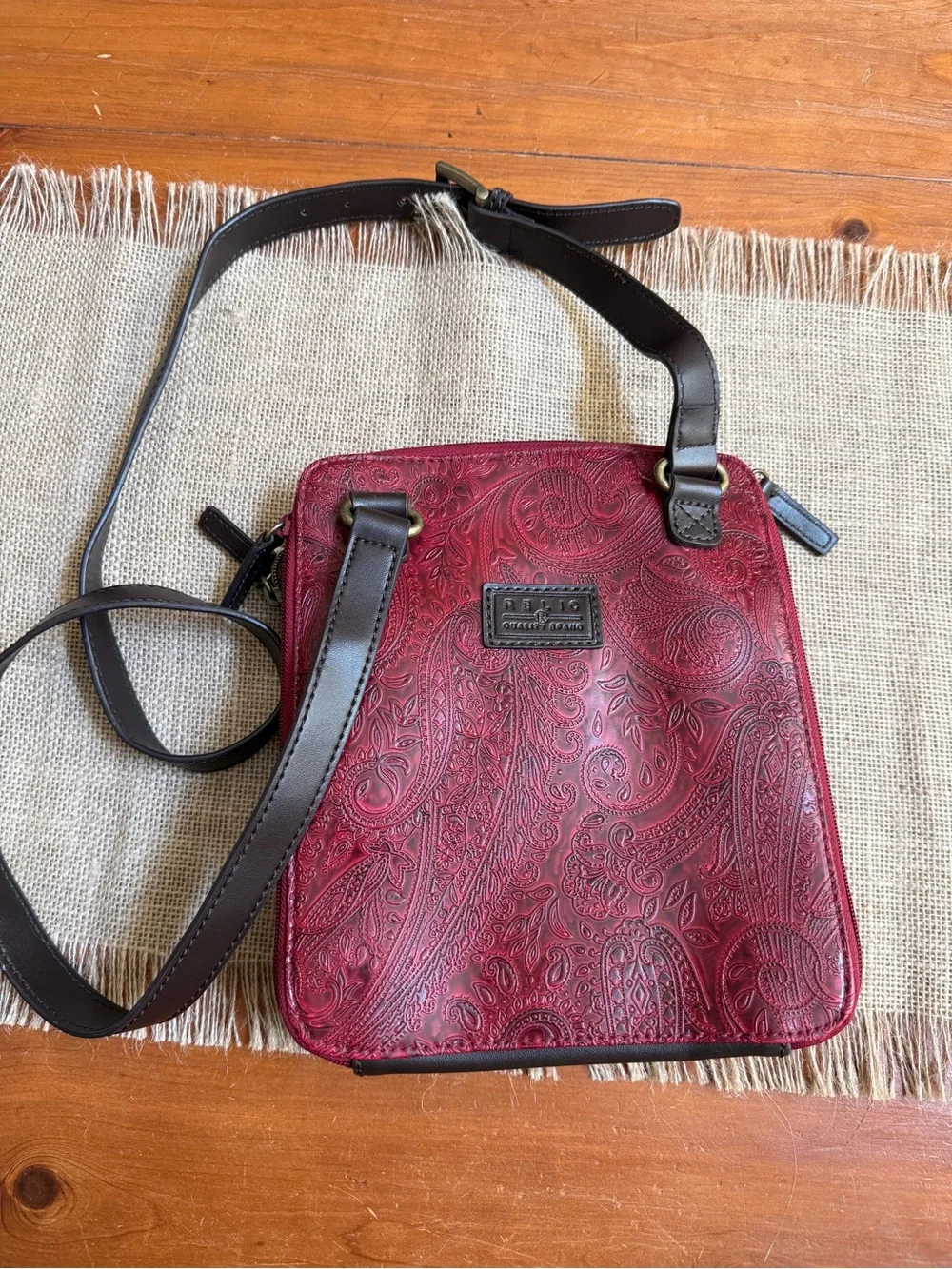 Relic Burgundy Paisley Embossed Leather Messenger Bag with Dark Brown Strap